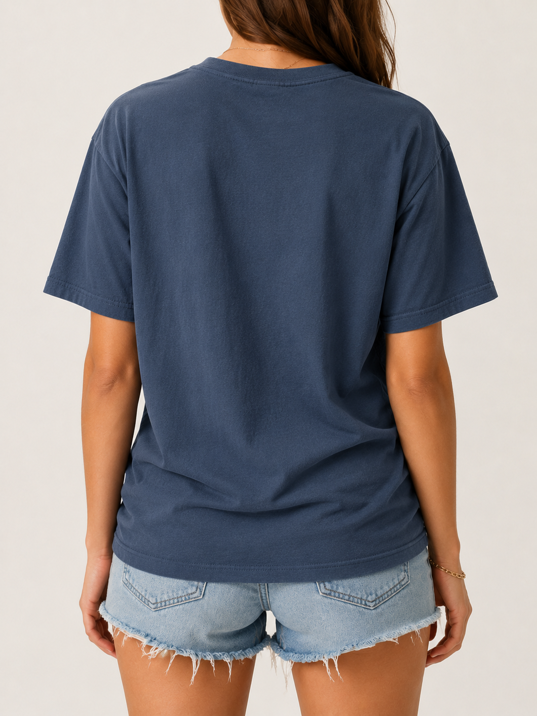 Back of the Ruxel Blind Luck Midnight Navy tee worn by a woman - plain with no print