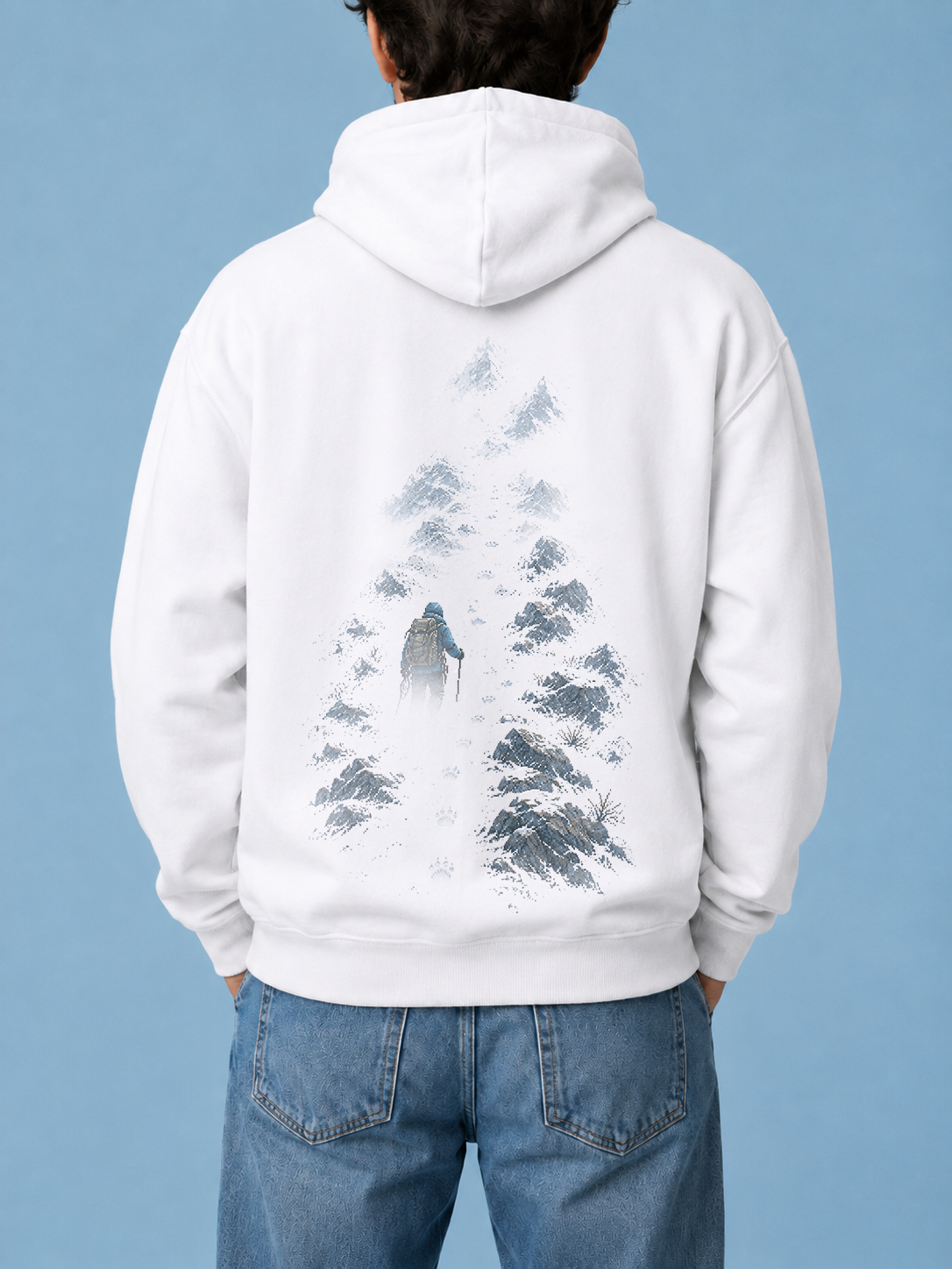 Back of Ruxel Call of the North Arctic White hoodie - pixel-art climber ascending a snowy ridge with bear paw prints in the snow