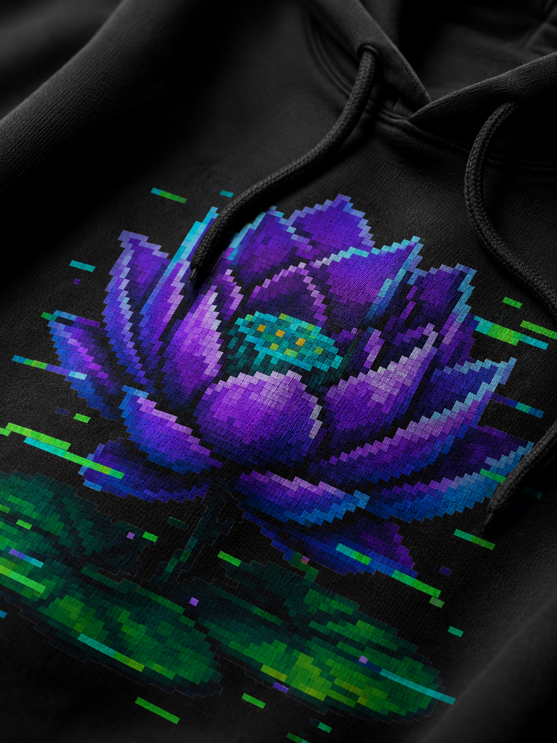 Close-up of the Glitch Lotus pixel print on a Ruxel Void Black heavyweight hoodie — violet petals and glitch streaks