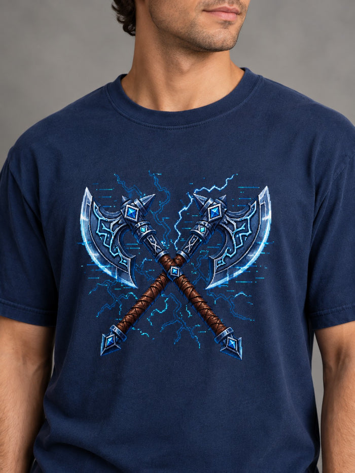 Close-up of a man wearing the Ruxel Dual Wield Axes navy heavyweight tee with crossed battle axes and electric blue pixel lightning