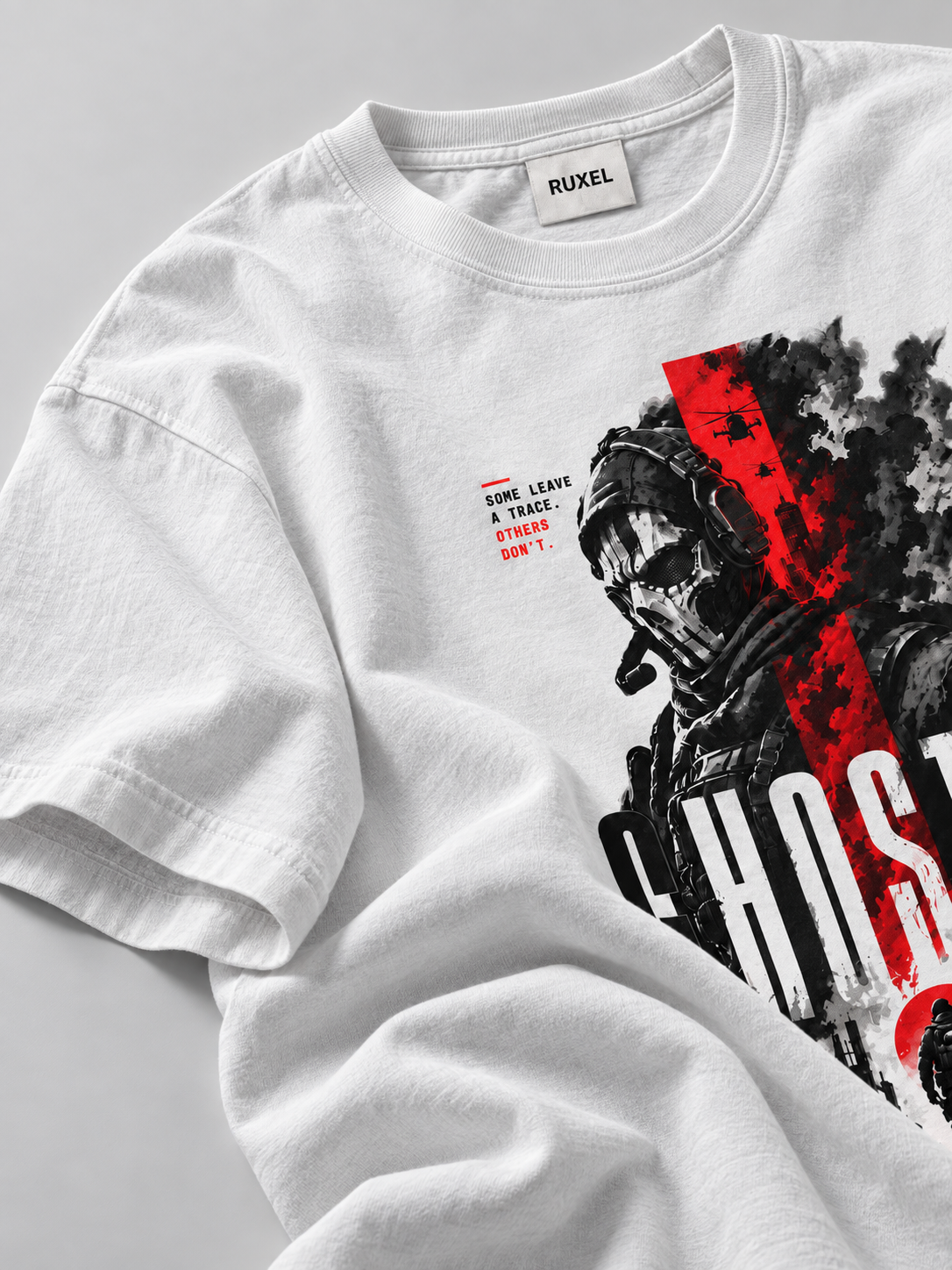 Close-up of white heavyweight cotton fabric and the Ruxel neck label on the Ghosted graphic tee