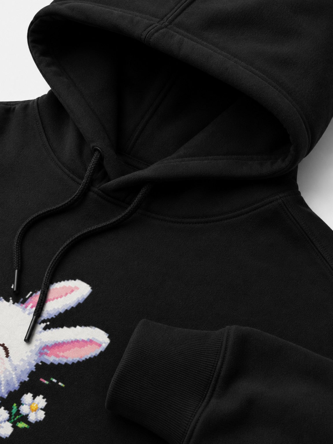 Close-up of the Ruxel Good Luck Loading Void Black hoodie showing the hood, drawcords, ribbed cuff and heavyweight fabric
