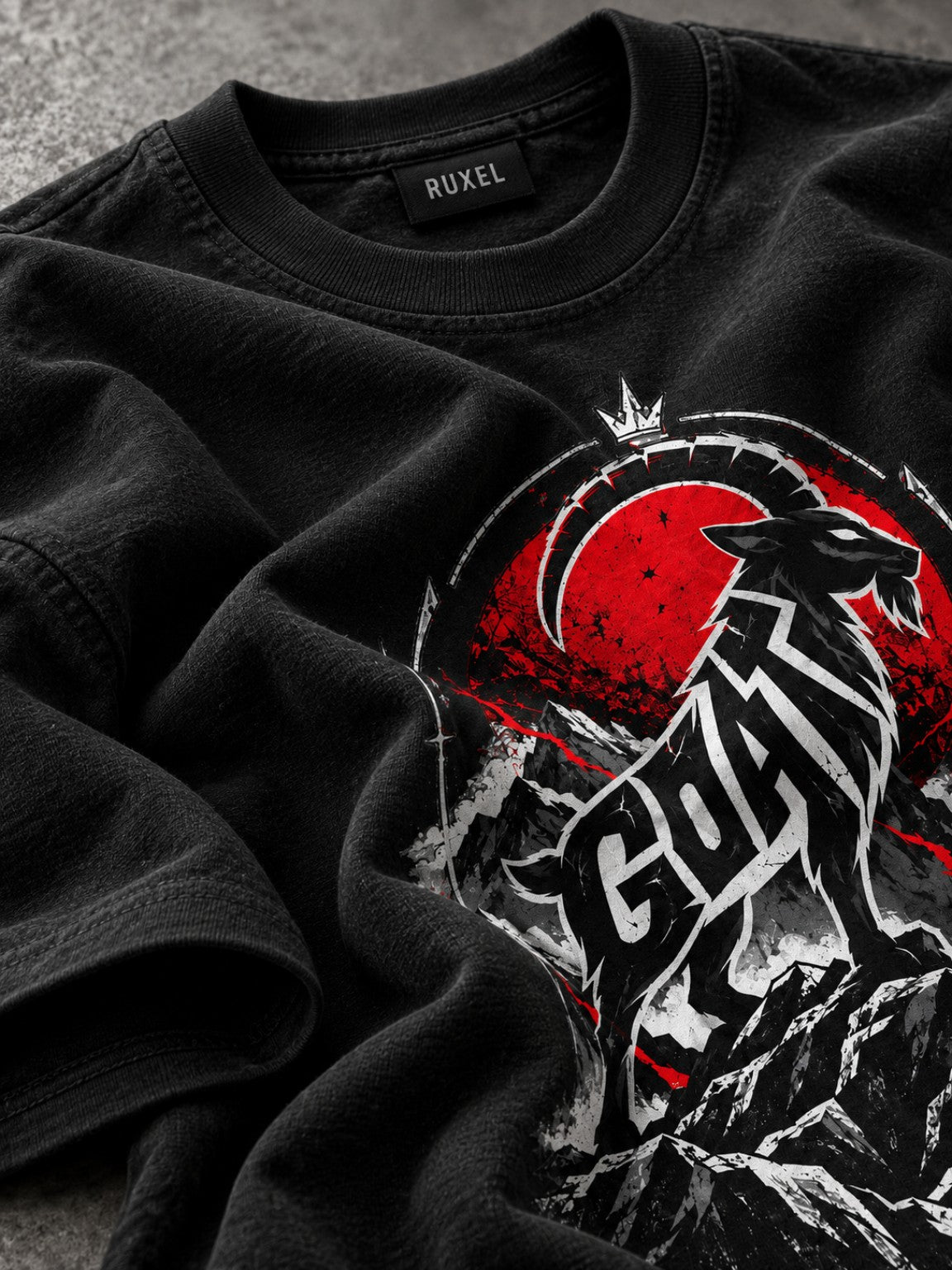 Fabric, Ruxel neck label, and artwork detail of the Peak Instinct heavyweight tee