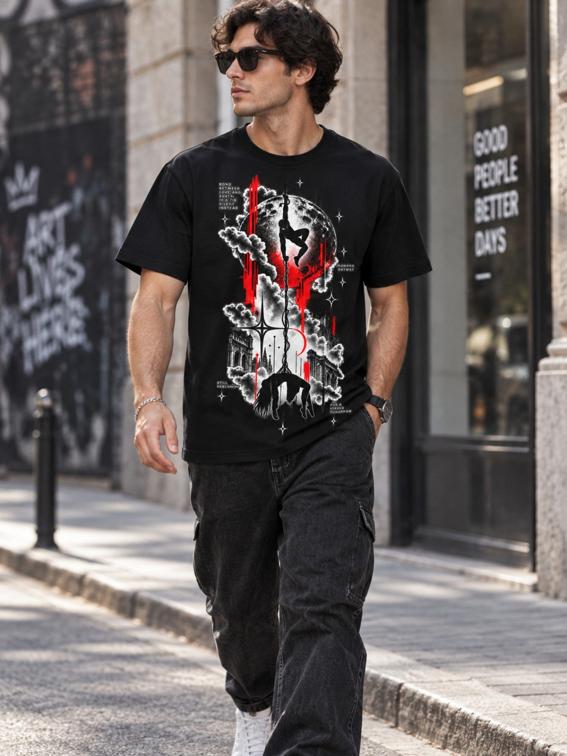 Male model walking in the Tethered Souls heavyweight graphic tee, front lifestyle view